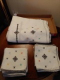 Hand embroidered tablecloth and napkins. 54 x 90