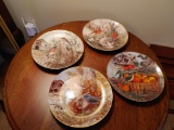 Four Franklin mint bird plates