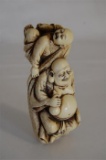 19th Century Carved Ivory  Ivorine Okimono Happy Buddha Carrying Child H 12