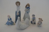 Six Porcelain Figurines Including Lladro  Nao Porcelain Dove Girl with Hat