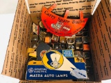 Large assortment of automobile light bulbs and advertising
