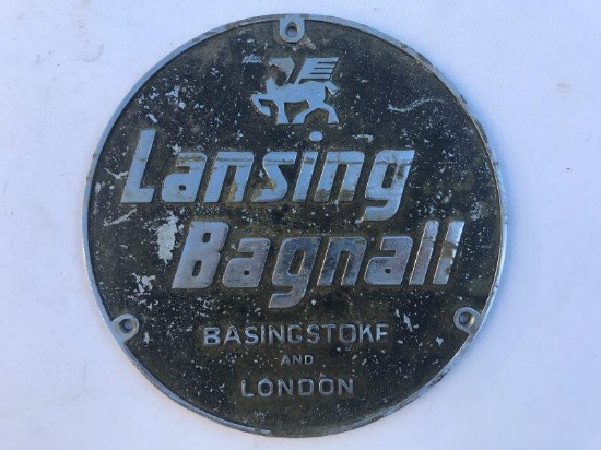 A circular plaque advertising Lansing Bagnall of Basingstoke and London, 8