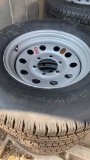2 of 4 new tires 225/75 r15 w/rim