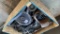 Crate of diesel motor parts