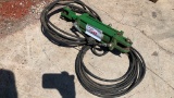 Hydraulic cylinder with hoses
