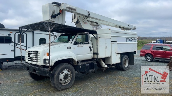 1999 GMC C7500 60’ Bucket Chip Truck