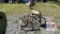 Metal Cardinal on Tricycle