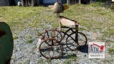 Metal Cardinal on Tricycle