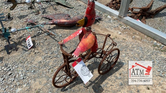 Metal Cardinal on Tricycle