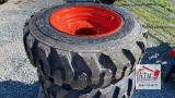 (4) 10-16.5 Skidsteer Tires on Bobcat Wheels