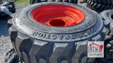 (4) 12-16.5 Skidsteer Tires on Bobcat Wheels