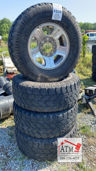 (4) 35x12.50R18 Tires and 10 Lug Wheels