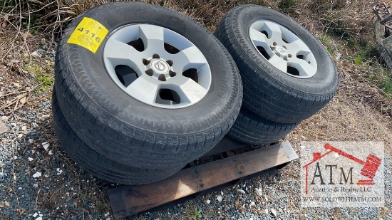 (4) Nissan Wheels and Tires
