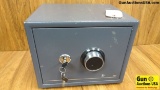 RY Hand Gun Safe . Good Condition. Great Safe to Keep Your Firearms Secure. Hammered Grey Metal Fini