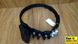Bladetech Gun Belt . Like New. Adjustable Belt up to 52 Inch Waist Band, Also has a Right Handle Rev