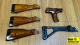 Stocks. Good Condition. Four AK47 Rear Stocks, 1 Fore Grip with Pistol Grip. (34202)