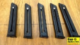 Ruger 22 LR Magazines. Very Good. Five 10 Round Magazines With Red and Silver Medallion Bases. . (34