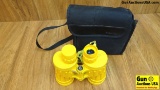 Bushnell Marine Binoculars. Good Condition. Binoculars with Case , 7x50 Yellow Armored Marine.. (366