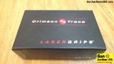 Crimson Trace LG-490 Laser Grip. NEW in Box. This Polymer Grip has Over Molded Activation with Red L