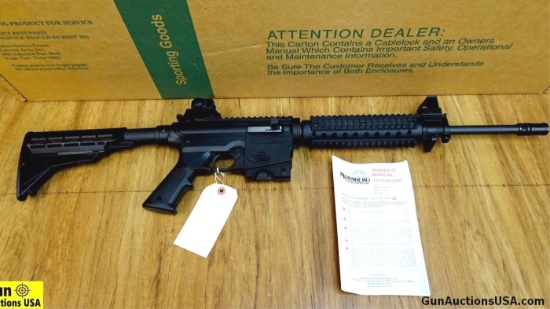 Mossberg 715T .22 LR Rifle. NEW in Box. 16" Barrel. Resembles a AR, Features a Polymer Lower, Quad R