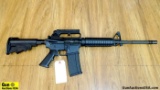 BUSHMASTER XM15-E2S 5.56 NATO Rifle. Very Good. 16