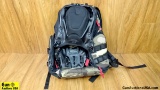Oakley 20 Tactical Field Pack . Very Good. Camo Green With Multiple Attachment Points and Adjustable