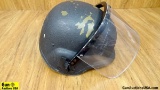 U.S. Military Helmet/Face Shield . Good Condition. Black Helmet with Face Shield. . (50062)