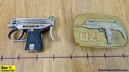 UZI- ACTION ARMS UZI COLLECTOR'S Belt Buckle/Lighter. Very Good. Solid Bronze Action Arms Limited UZ