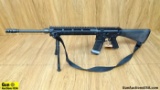 BUSHMASTER XM15-E2S 5.56 NATO Rifle. Very Good. 22