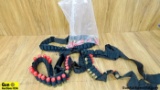 Winchester 12 Ga. Ammo/Belts. 41 Rounds of Ammo and Four Belt Shell Holders. . (56821)