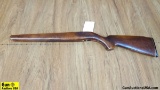 Mossberg Stock. Fair Condition. Hardwood Stock. . (56929)