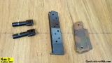 Pachmayr, Etc. Grips, Magazine, Etc. . Very Good. Lot of 4; One 45 ACP Steel High Cap Magazine, Made