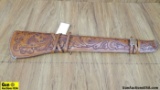 Rifle Scabbard. Good Condition. Leather Tooled Rifle, Fleece Line Scabbard with Tie Down Straps. . (
