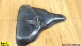 P38 Holster. Good Condition. Black Leather Clamshell Holster for the P38. . (53963)