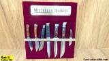 MITCHELLS SABRES Knives. COLLECTORS. 7 Knives with Display. Original Dealers Display. Includes the C