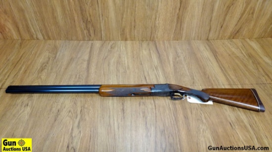 Browning 12 ga. Over- Under Shotgun. Excellent  Condition. 30" Barrel. Shiny Bore, Tight action  Eng