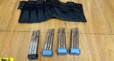 STI 9MM Magazines. Excellent Condition. Lot of 5; Four Steel Competition Magazines and One Mag Holde