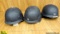 Korean Helmets. Fair Condition. Lot of 3; Padded Black Composite Helmets with Chin Strap. . (62062)