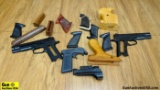Can Gun, NC Star, Etc. Grips/Sight . Good Condition. Assorted Plastic and Wood Grips and One NC Star