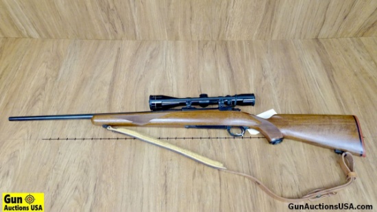 Ruger M77 243 WIN Bolt Action Rifle. Very Good. 22" Barrel. Shiny Bore, Tight Action Very Nice Wood
