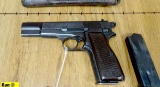 FABRIQUE NATIONALE D'ARMES DE GUERRE HERSTAL BELGIQUE NMN Appears to be 9MM Semi Auto Pistol. Good C