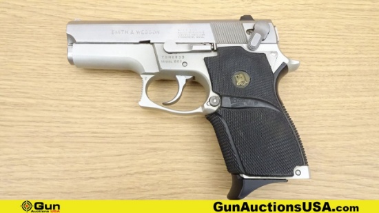 S&W 669 9MM PARA Semi Auto Pistol. Like New. 3.5" Barrel. Features a Stainless steel slide, aluminum