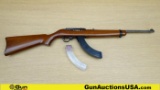RUGER 10-22 .22 LR Rifle. Good condition, Normal Handling Marks, Scattered Spotting and/or Pitting.