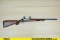 Ruger 77/22 .22 LR Rifle. Good condition, Normal Handling Marks, Scattered Spotting and/or Pitting.