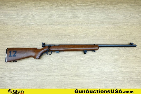 MOSSBERG 144 LSB .22 LR HEAVY BARREL Rifle. Good condition, Normal Handling Marks, Scattered Spottin