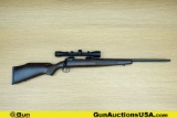 Savage 10 .223 RIFLE. Good condition, Normal Handling Marks, Scattered Spotting and/or Pitting. 22