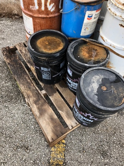 pallet of grease buckets
