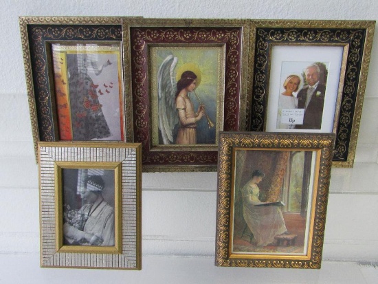 Decorative Photo Frames. 5 Assorted Sizes. Approx 6"x8" to 8"x10". They appear to be in good condit