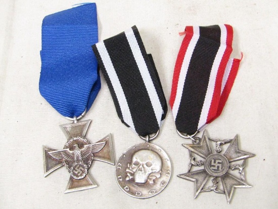 Group of THREE German WWII Third Reich period crosses and medals.