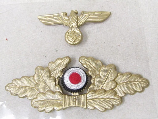 Group of TWO Hat badges for the German WWII Third Reich period Kriegsmarine Visor hat.